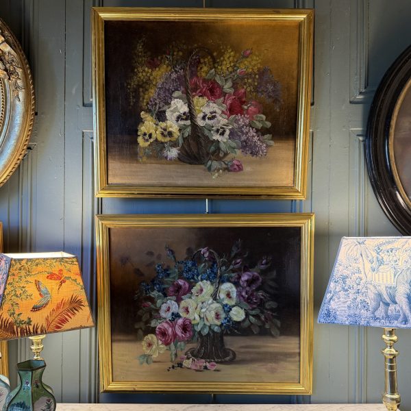 Paire de bouquets aux paniers de fleurs